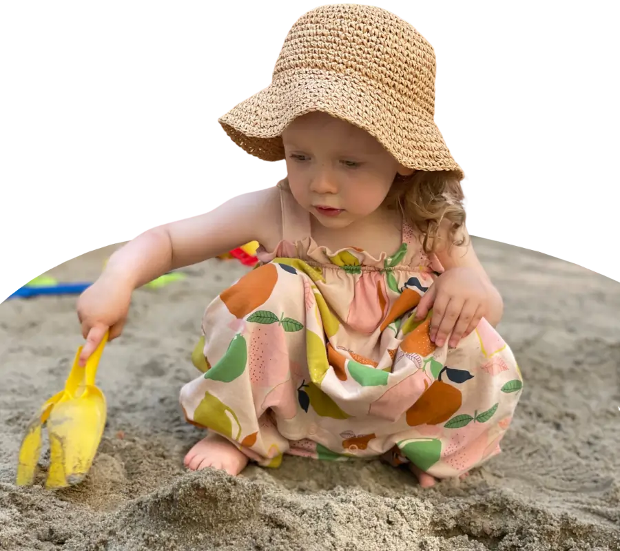 young child playing in the sand at our family day care rockdale